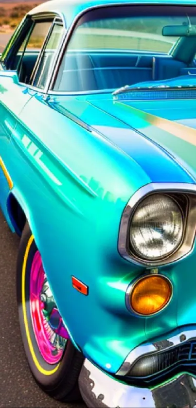 Turquoise vintage car on a scenic road.