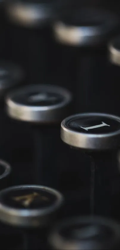 Close-up of vintage typewriter keys with a dark, retro aesthetic.