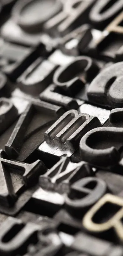 Monochrome vintage typography wallpaper featuring classic letterpress blocks.