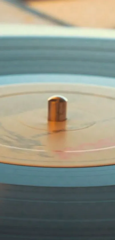 Close-up of a spinning vinyl record, highlighting its grooves and center.