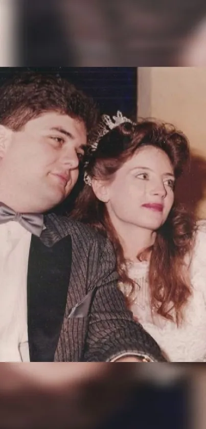 Vintage wedding couple in elegant attire.