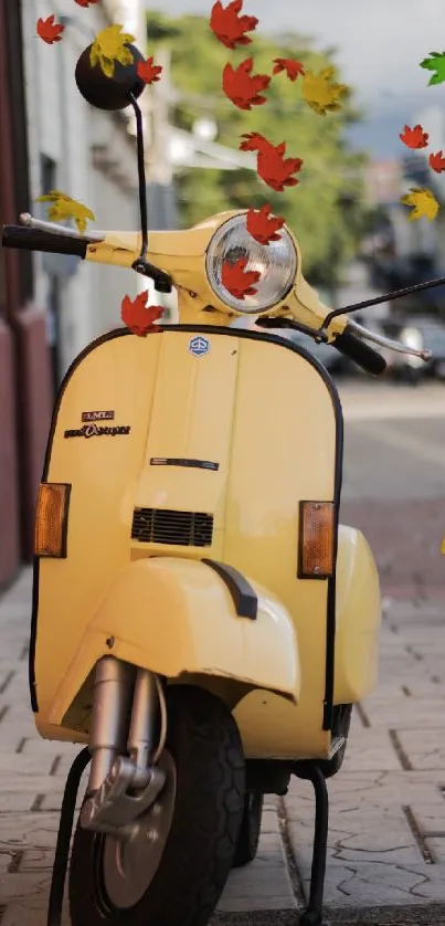 Vintage yellow scooter parked on quiet street.