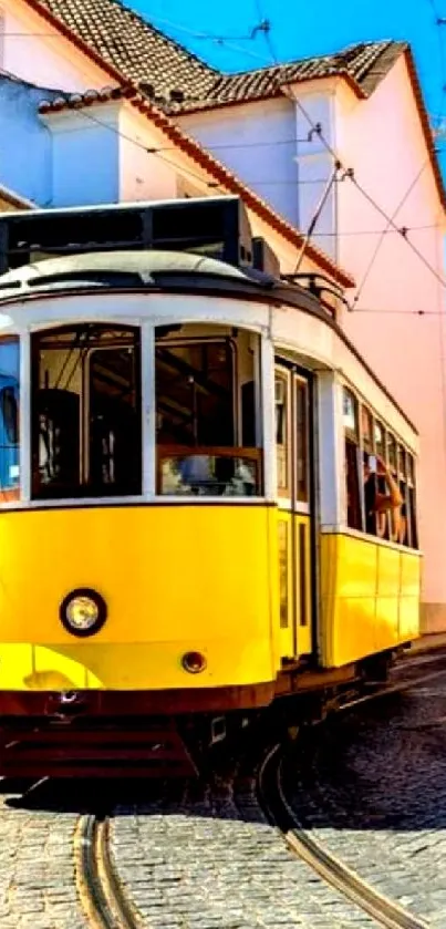 A vintage yellow tram on a sunny urban street corner.