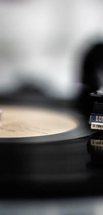 Close-up of a vinyl record player spinning.