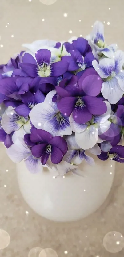 Violet flowers in white vase with bokeh effect.