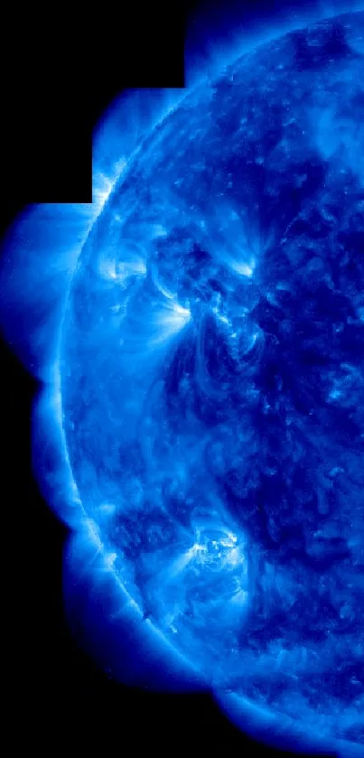 Vivid blue solar flare image with detailed sun surface.