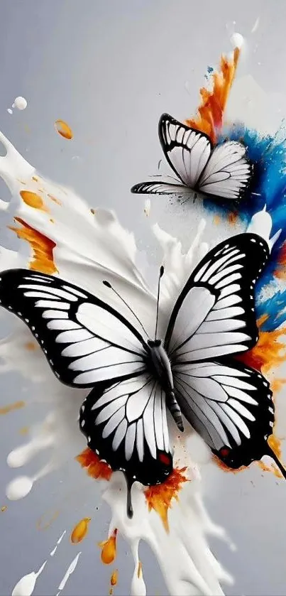 Artistic wallpaper with butterflies and vibrant paint splashes.