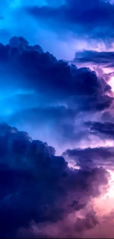 Vivid clouds in blue and purple sky wallpaper.