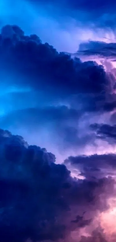 Vibrant cloudy sky with purple and blue hues for mobile wallpaper.