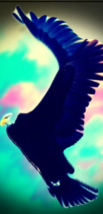 Majestic eagle soaring in a colorful sky wallpaper.