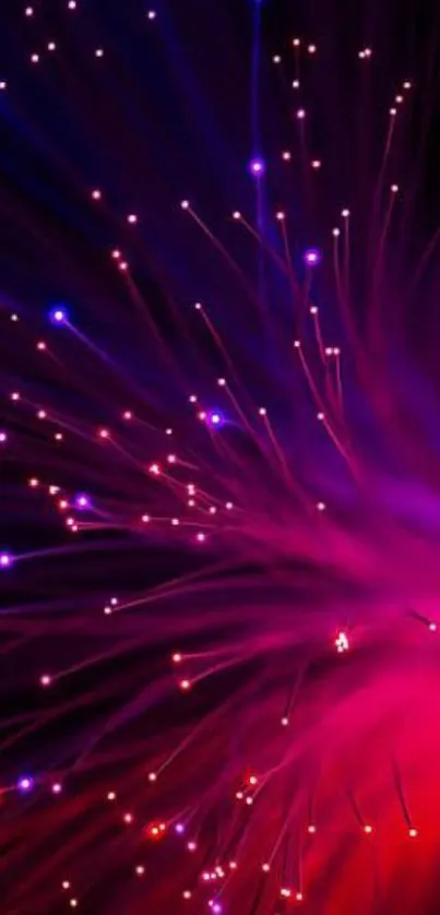 Vibrant red and purple fiber optic light display on mobile wallpaper.