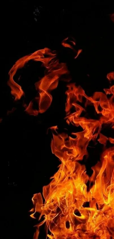 Vivid orange flames on a black background for a dynamic phone wallpaper.