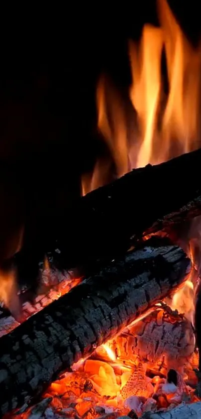 Vivid wallpaper showing glowing firewood and bright flames.