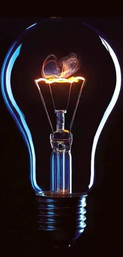 Glowing light bulb with brilliant blue and orange hues on a dark background.