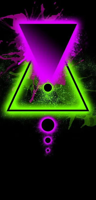 Neon geometric shapes on black background with pink and green highlights.