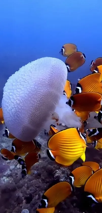 Jellyfish surrounded by tropical fish in a vibrant underwater scene.