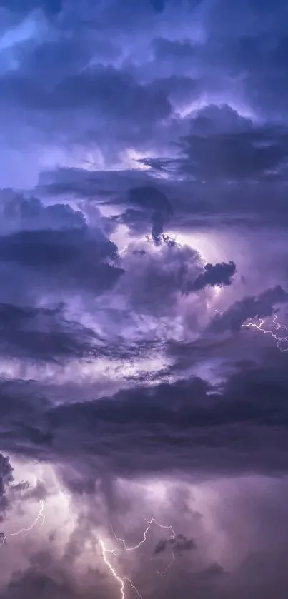 Purple storm clouds with lightning illuminating the sky.