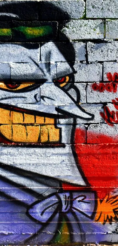 Graffiti mural with colorful sinister face on brick wall.