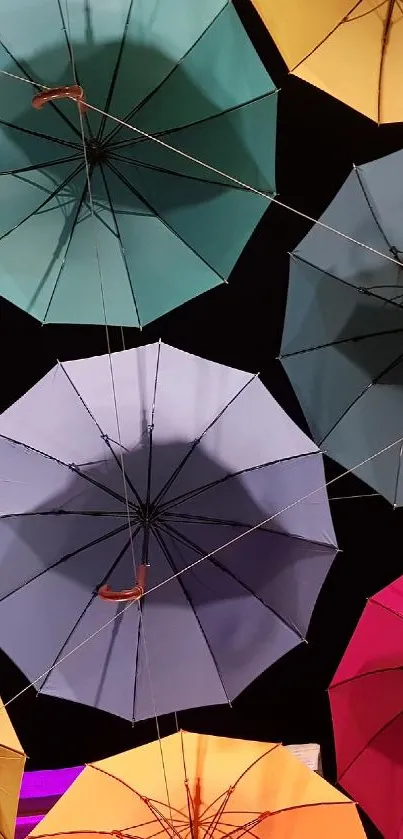 Vibrant wallpaper featuring colorful umbrellas in a dynamic arrangement.