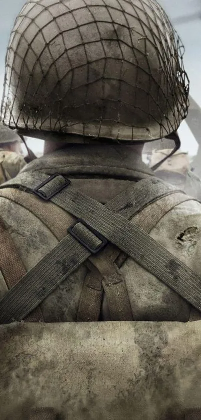 Soldier with helmet in war-themed mobile wallpaper.