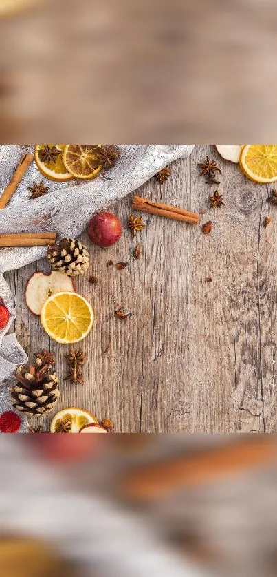 Rustic autumn wallpaper with wood, oranges, and cinnamon sticks.