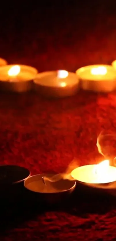 Warm candlelight with dark red background.