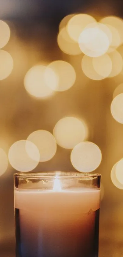 Warm candlelight with golden bokeh effect wallpaper.