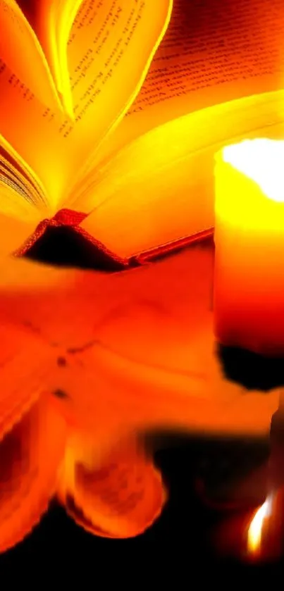 Candle illuminating an open book with orange glow.