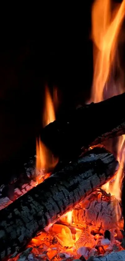 Glowing fireplace with vibrant, orange flames and burning logs.