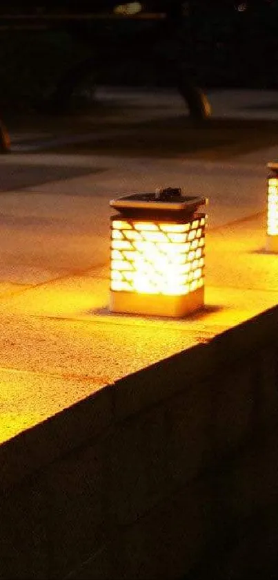 Three lanterns emit warm light on a stone platform, creating ambient outdoor lighting.