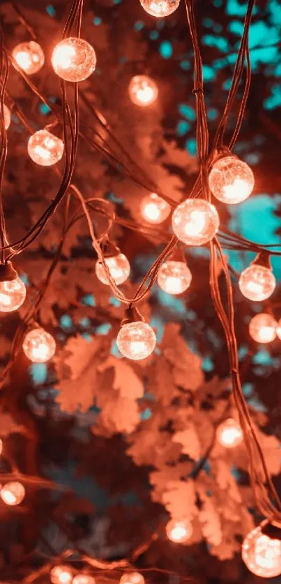 Mobile wallpaper with warm orange string lights and forest background.