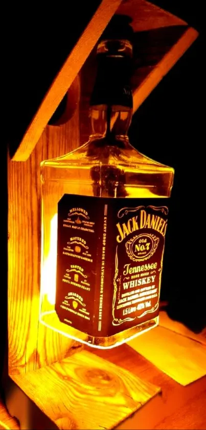 Warm whiskey bottle lamp glowing with a golden hue.