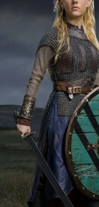 Warrior in chainmail armor holding a shield and sword.