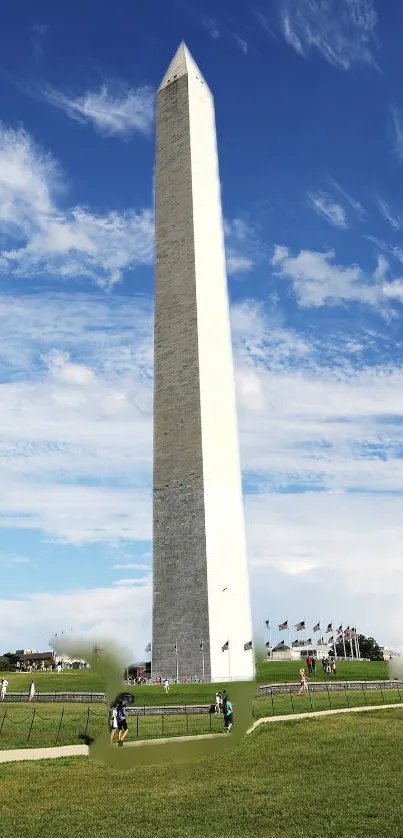 Washington Monument under a blue sky with clouds, perfect mobile wallpaper.