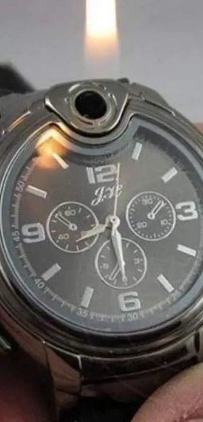 Watch with lighter showcasing flame design.