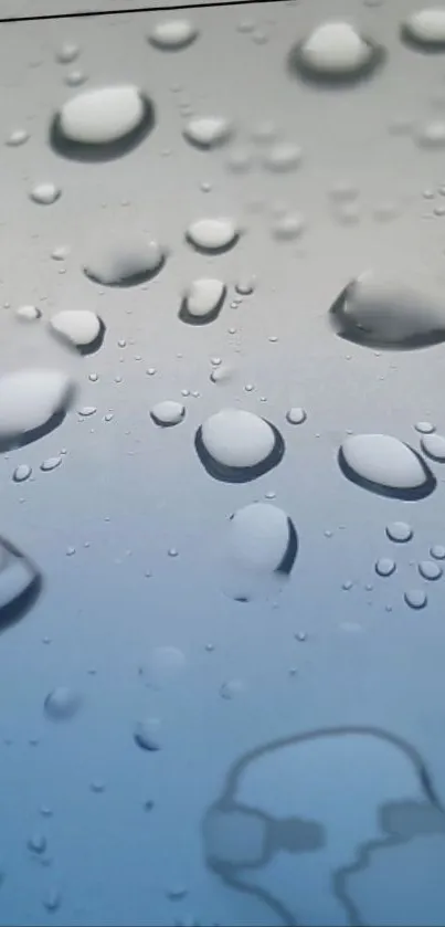 Water droplets on smooth glass surface.