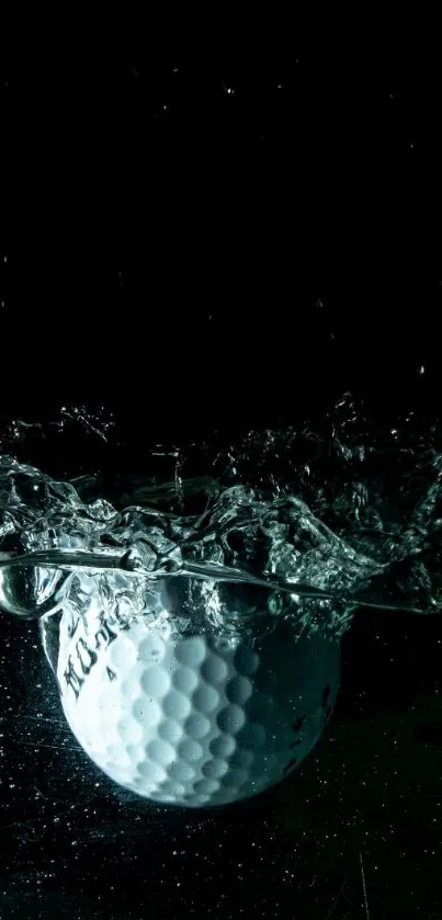 Golf ball splashes through water with dramatic lighting.