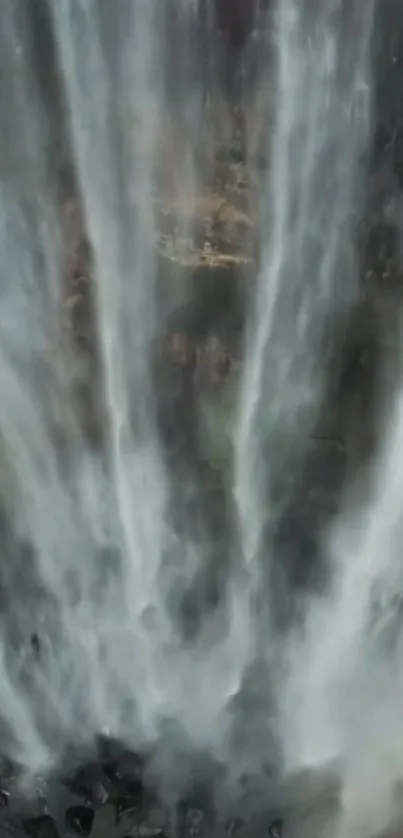 Majestic waterfall mobile wallpaper with cascading water.