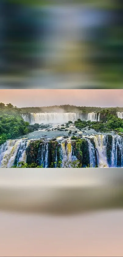 Stunning waterfall wallpaper with vibrant greenery and cascading water.