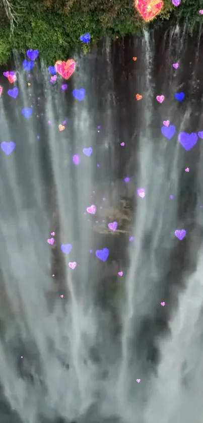 Waterfall with colorful floating hearts wallpaper.