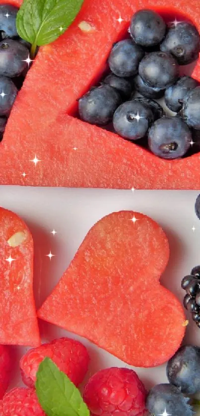 Heart-shaped watermelon and berry wallpaper with mint leaves.