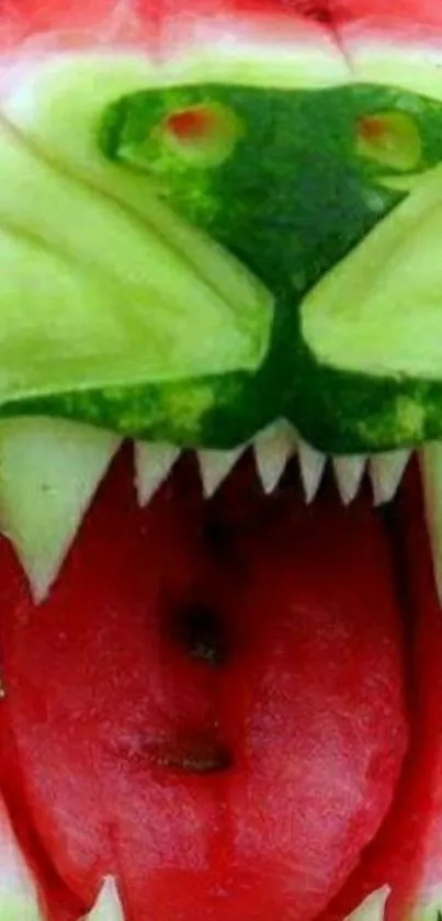 Watermelon carved to resemble a lion's face, vibrant and colorful.