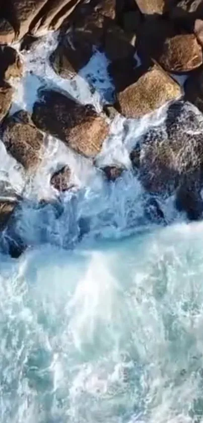 Ocean waves crashing on rocky coastline with blue hues.