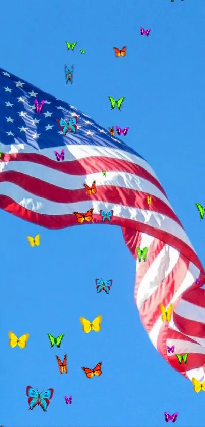 Waving American flag against a clear blue sky, symbolizing national pride.