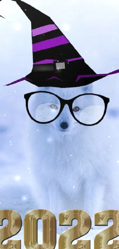 Arctic fox with witch hat and 2022 text in snowy scene.