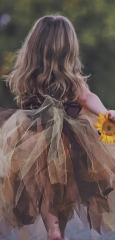 Girl in brown dress holding sunflower, autumn scene.