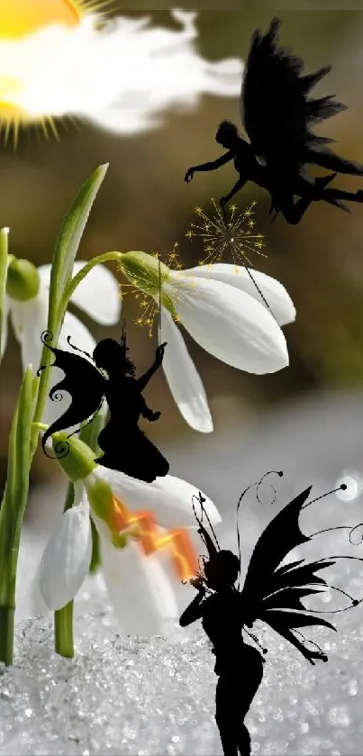 Fairies dance around snowdrop flowers under a bright sun on a snowy background.