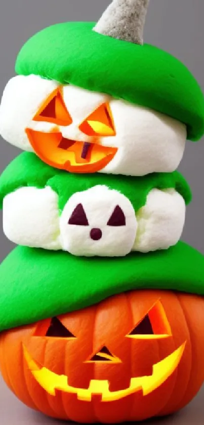 Whimsical stack of green-capped pumpkins with smiling faces.