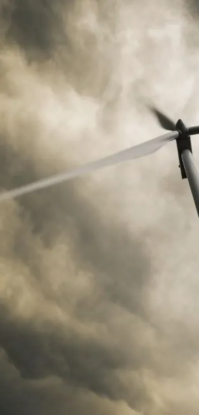 Wind turbine against a dramatic cloudy sky.