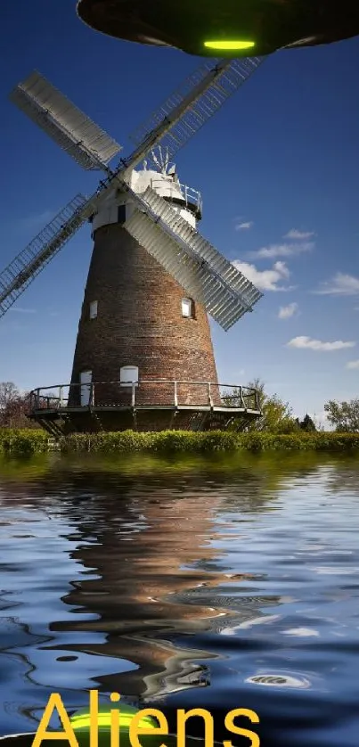 Windmill reflected in water with UFOs and 'Aliens' text overlay.